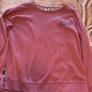 2 PINK crew necks. Both are size small.